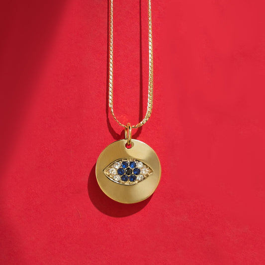 Alison Mariot evil eye necklace in 18K gold vermeil with blue Swarovski crystals