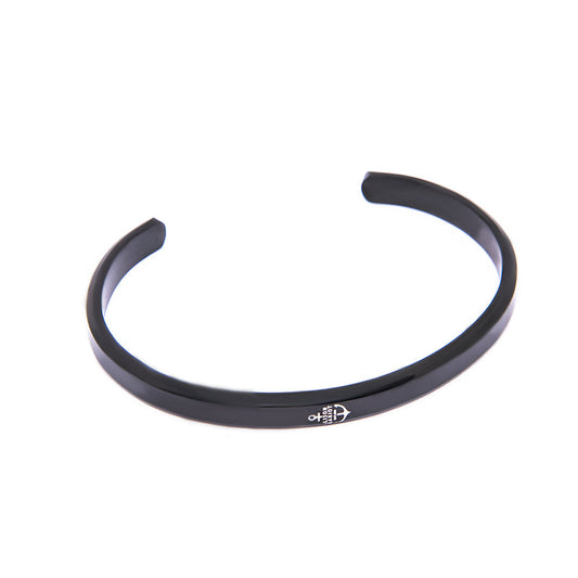 Alison Mariot adjustable bangle in 316L steel with black rhodium and embossed logo