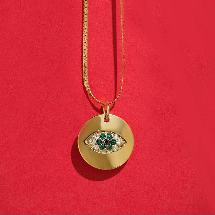 Alison Mariot evil eye necklace in 18K gold vermeil with green Swarovski crystals