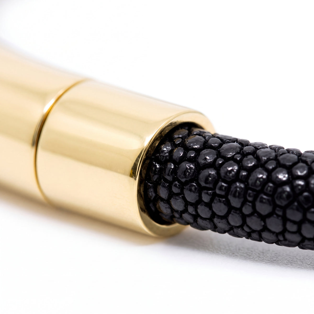 Alison Mariot black stingray leather bracelet — close-up of the stingray texture and gold clasp