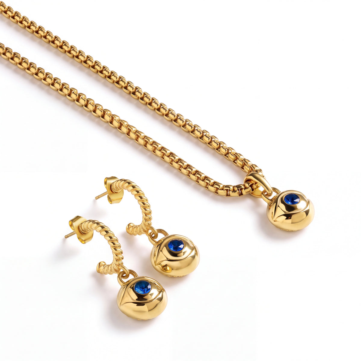Alison Mariot Blue evil eye necklace and earrings with blue crystals — angled view