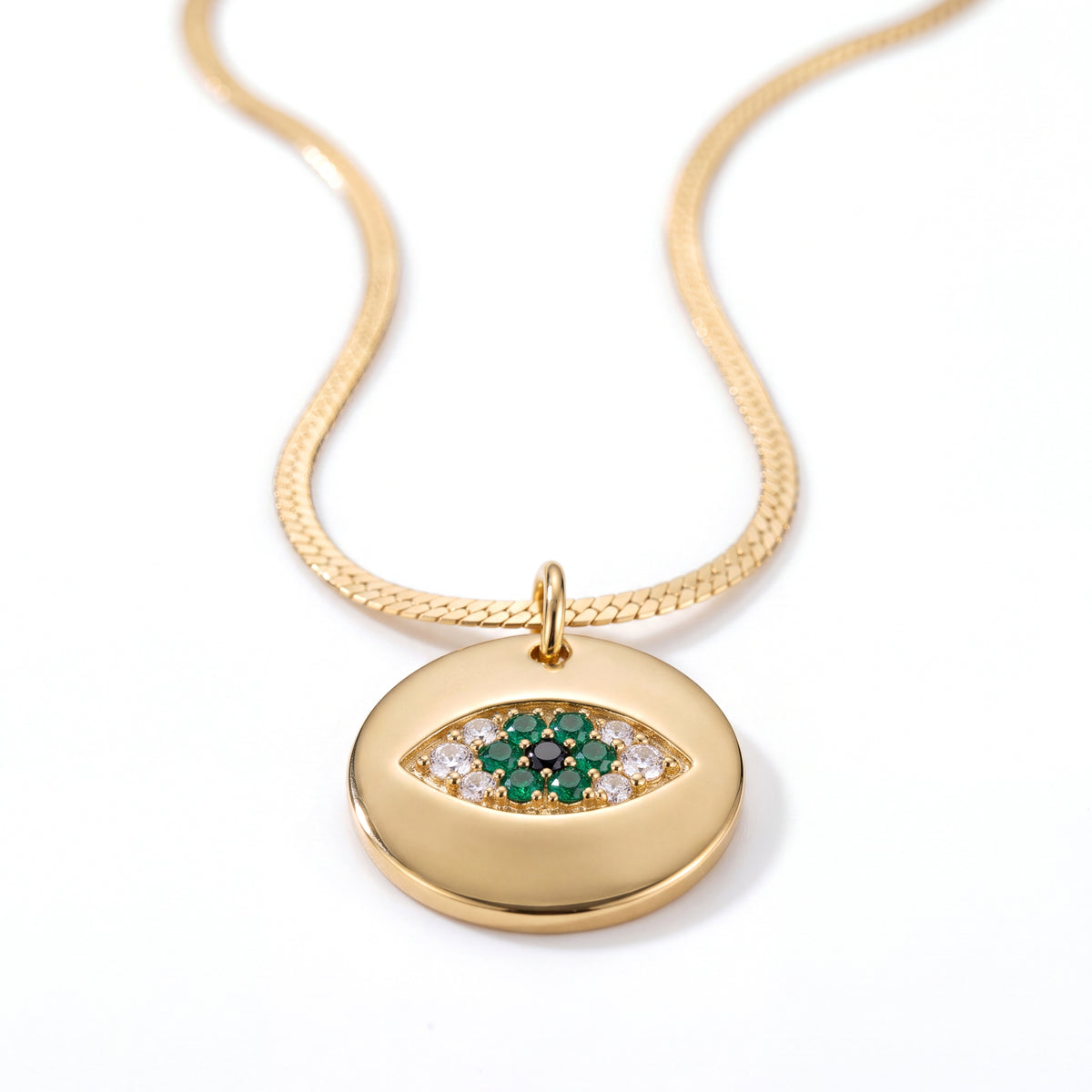 Alison Mariot Emerald evil eye necklace with green crystals — front view