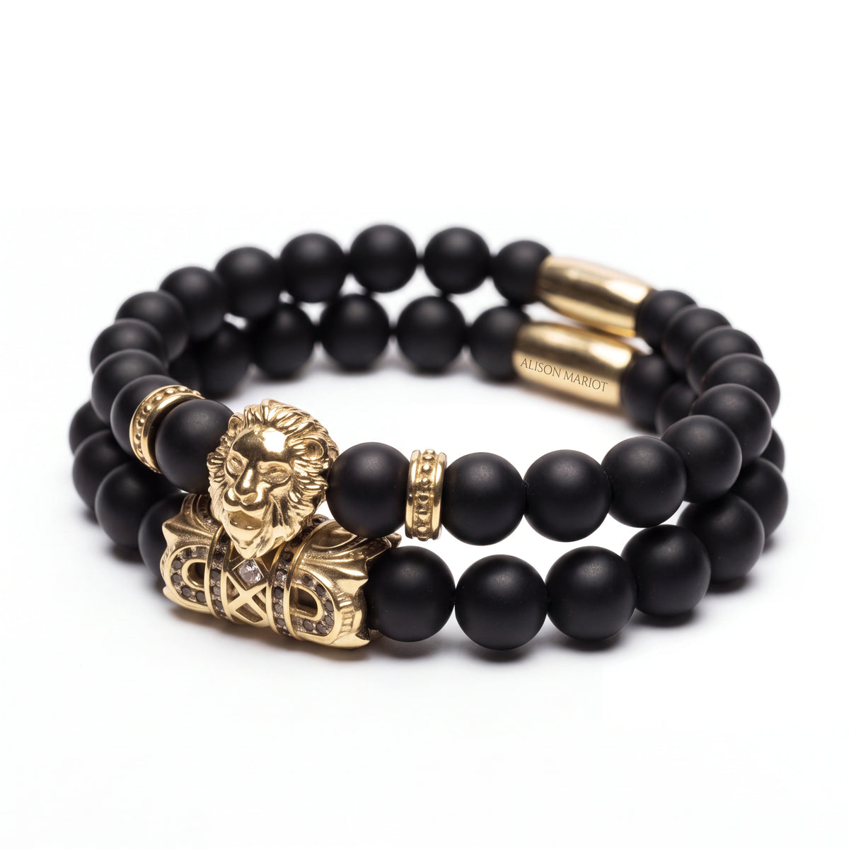 Alison Mariot beaded bracelet in natural matte black onyx with 18K gold PVD lion — angled view