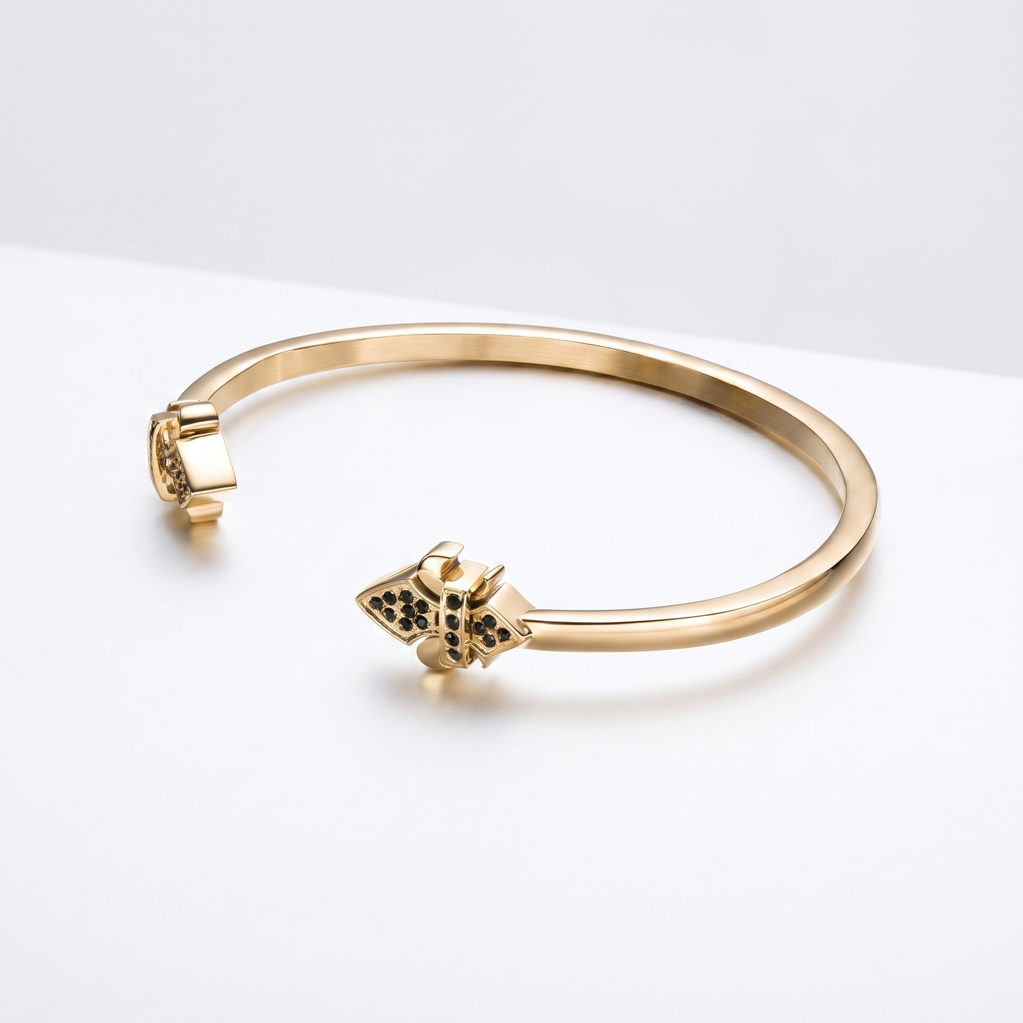 Alison Mariot fleur-de-lis bangle in 316L steel with 18K gold PVD emblem — alternate view