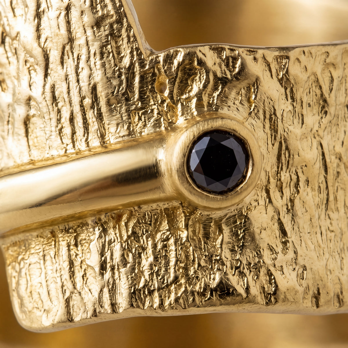 Alison Mariot Nyxra ring — close-up of the black Swarovski crystal and textured gold