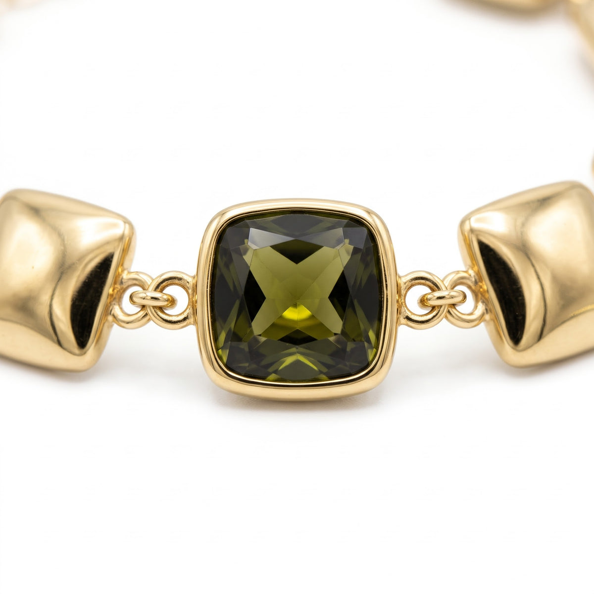 Alison Mariot VERDÉA — close-up of a cushion-cut natural green tourmaline in an 18K gold vermeil bezel