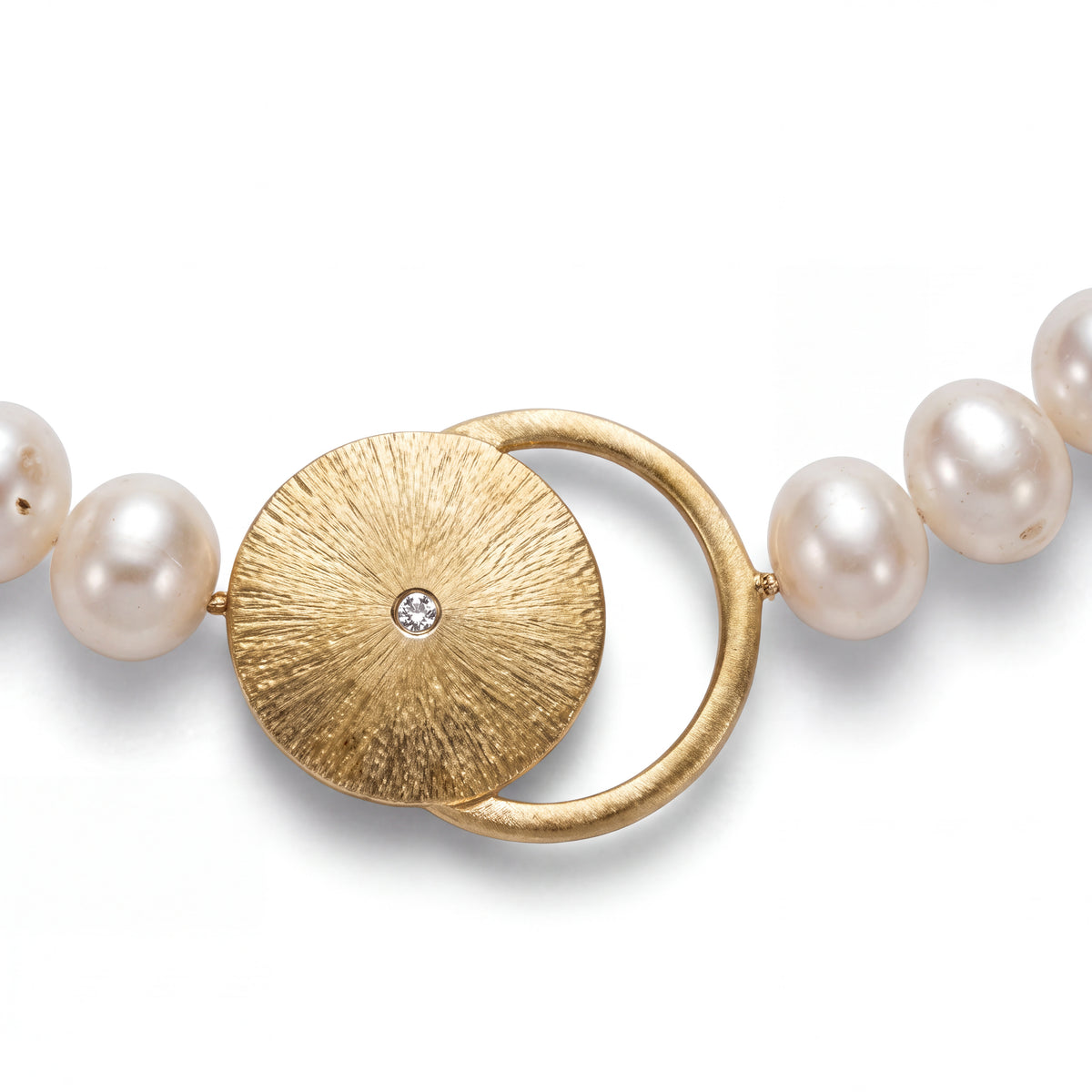 Alison Mariot Thaleli necklace — close-up of the sun-ray pendant in 18K gold vermeil